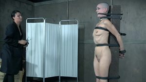  Hardcore punishment for a slender bald hottie in the dungeon
