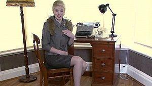  Stylish blonde teasing you in her office