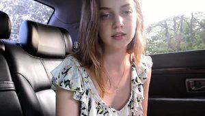  Enticing camgirl puts her lovely tits on display in the car